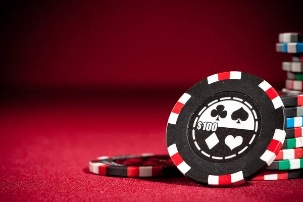 Live dealer shaking dice in a Sic Bo cup at a koihoki studio
